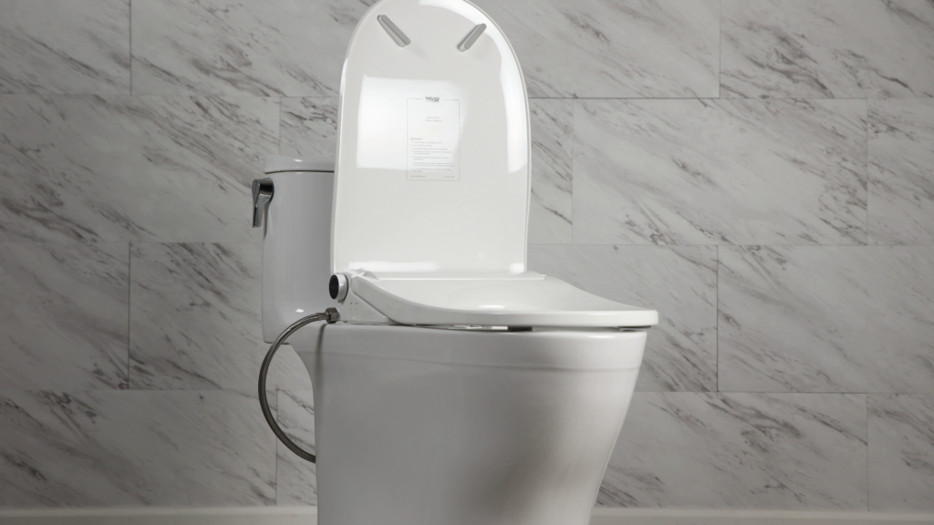 An image of the Ultra NOVA bidet seat installed on a toilet with the lid open